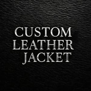 Premium custom leather jacket branding with elegant silver embossed typography on black leather surface