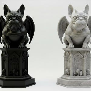 May include: Two French bulldog gargoyle statues, one matte black and one light grey stone finish. Each figure features bat-like wings and sits atop an ornate, hexagonal pedestal decorated with small carved details and arched architectural motifs.
