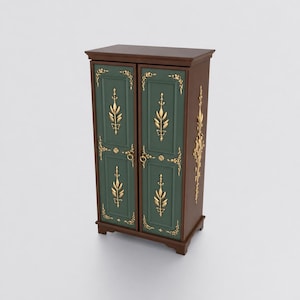 May include: A tall, rectangular cabinet with a dark brown frame and two deep green doors. The doors feature ornate gold-colored floral and leaf-shaped metal appliqués, small circular gold ring pulls, and decorative gold corner accents.