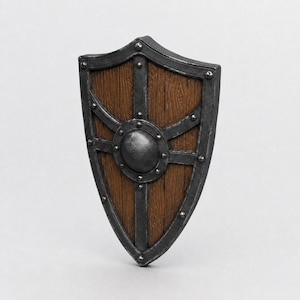 May include: A heater shield featuring a brown wood grain texture on the main surface, reinforced by a dark gray metallic frame and a central circular boss. The frame is secured with evenly spaced rivets along the edges and the cross-shaped bracing.