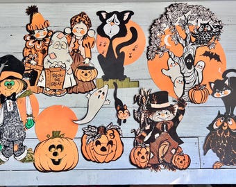 May include: A collection of vintage Halloween decorations featuring various characters and objects. The cutouts include a scarecrow, ghosts, cats, pumpkins, and an owl. The color palette consists of orange, black, white, and brown, evoking a classic Halloween theme.