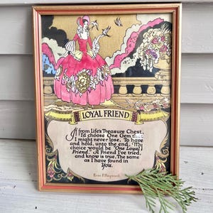 May include: Framed vintage print featuring a woman in a pink dress with a floral design, holding birds. The print has the words "LOYAL FRIEND" and a poem about friendship. The frame is a reddish-brown color.