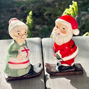 Mid-Century Lefton Santa + Mrs. Claus Skiers