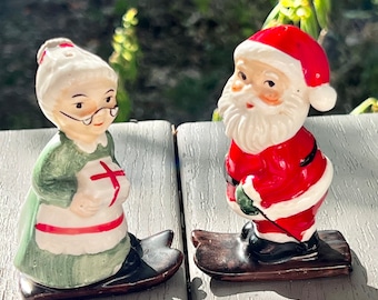 Mid-Century Lefton Santa + Mrs. Claus Skiers