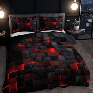 May include: A black and red geometric pattern bedding set. The duvet cover and pillowcases feature a 3D cube design with red highlights. The set is displayed on a bed with a dark headboard.