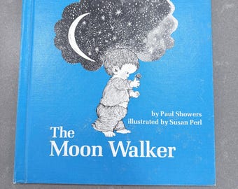 El caminante lunar, de Paul Showers y Susan Perl, 1975, 1.ª edición, libro infantil antiguo.
