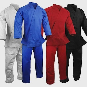 May include: Four martial arts uniforms in white, blue, red, and black. Each uniform includes a jacket with a V-neck and matching pants. The uniforms are made of a durable fabric, suitable for training and competition.