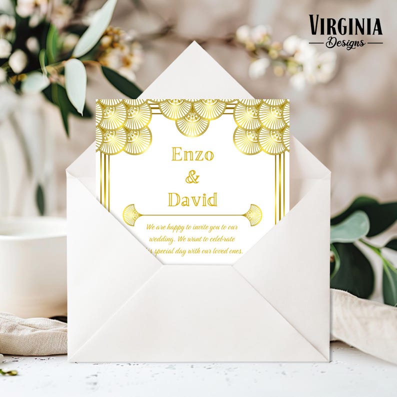 May include: A white wedding invitation card with gold art deco design is partially visible inside a white envelope. The card reads "Enzo & David" and includes text inviting guests to the wedding. The Virginia Designs logo is in the upper right corner.