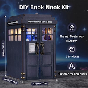 May include: A DIY Book Nook Kit, themed "Mysterious Blue Box", features a dark blue wooden structure with dimensions of 9.45 inches high, 7.09 inches wide, and 5.12 inches deep. The kit includes 368 pieces and is suitable for beginners. The text "Mysterious Blue Box" is visible.