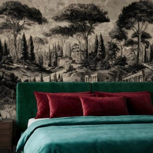 May include: A bedroom scene featuring a green velvet headboard, burgundy throw pillows, and a teal duvet. The backdrop is a black and white mural depicting a classical landscape with trees and architectural ruins.