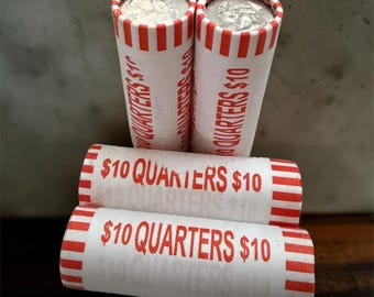 May include: Four rolls of quarters, each labeled "$10 QUARTERS $10" in red on a white background. The ends of the rolls have red and white stripes. The top rolls show the silver coins inside.