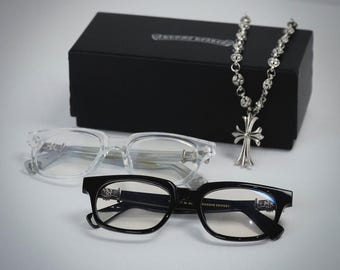 Gafas Chrome Hearts See You In Tea con montura de acetato y diseño de flor de lis.