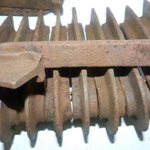 12 Vintage Railroad Rail Anchors – 24+ lb Forged Steel Anti-Creep Rail Hardware