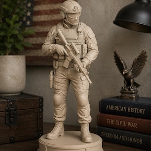 May include: A monochromatic beige figurine of a soldier in tactical gear, including a helmet, goggles, and a vest, holding a rifle. The soldier wears knee pads and combat boots, standing on a circular base. The figure is rendered in a single solid color.