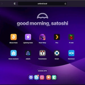 May include: A computer screen displays a purple gradient background with the text "good morning, satoshi" and app icons. Icons include Bitcoin Node, Lightning Node, Nostr Relay, Plex, Pi-hole, Home Assistant, Jellyfin, Transmission, Sonarr, and Nextcloud.