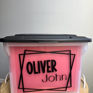 May include: A rustic wooden sign with the text "Welcome to our home" in white lettering. The sign features a distressed finish and a simple, inviting design, perfect for front door decor.