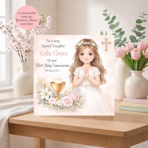 May include: A personalized First Holy Communion card featuring an illustration of a girl in a white dress, a floral crown, and a chalice. The card includes the text "To a very Special Daughter Laila Grace On your First Holy Communion 9th May 2026".