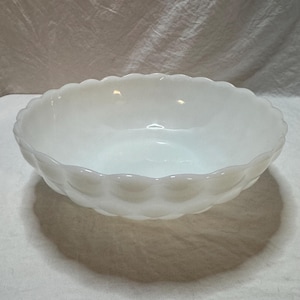 May include: A set of three ceramic mugs with a speckled, matte finish. The mugs are in shades of cream, light gray, and dark gray. Each mug has a simple, minimalist design, perfect for coffee or tea.