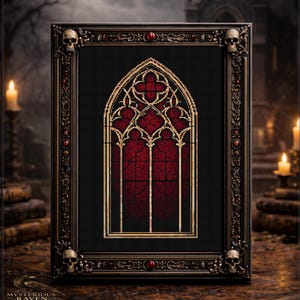 May include: Framed gothic window art with a dark red stained glass design. The frame is black with ornate detailing, including skulls at each corner. The artwork is set against a dark background with candles and books. The text "MYSTERIOUS RAVEN" is at the bottom.