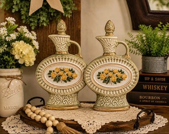 2 Vintage 1969 Jim Beam Bourbon Whiskey decanters.