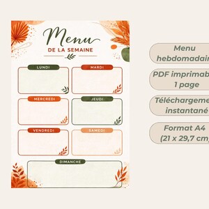 Peut inclure: Un planificateur de menu hebdomadaire avec un design aquarelle. Le titre "Menu DE LA SEMAINE" est en haut, avec les jours de la semaine dans des cases. Le design comprend des accents aquarelle orange et vert et le texte "Format A4 (21 x 29,7 cm)".