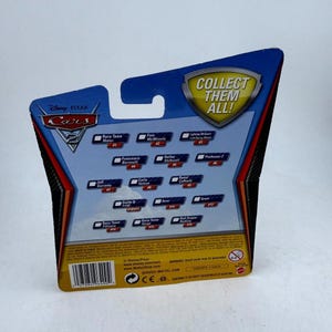 Disney Pixar Cars 2 Rayo McQueen con ruedas de carreras Mattel 2011 Diecast Nuevo imagen 2