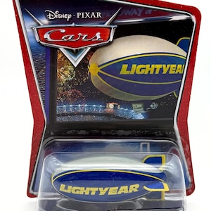 Mattel Disney Pixar Cars Al Oft the Lightyear Blimp M2952 Supercharged NIB