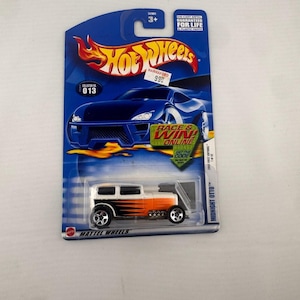 May include: A set of three ceramic mugs with a speckled, matte finish. The mugs are in shades of cream, light gray, and dark gray. Each mug has a simple, minimalist design, perfect for coffee or tea.