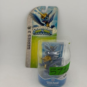 May include: A packaged Skylanders Swap Force Series 3 action figure, featuring a blue and gold dragon-like character named Horn Blast Whirlwind. The packaging includes the game's logo and character art.