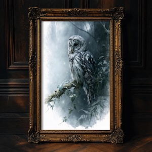 Barred owl watercolor printable wall art displayed in ornate gold frame leaning against dark wood paneled wall, moody gothic cottagecore aesthetic, instant digital download owl art print for home decor