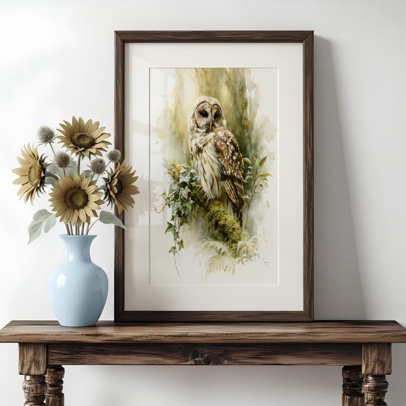 Framed watercolor owl printable art leaning on rustic wood console table with blue vase and dried sunflowers, cottagecore farmhouse home decor, instant digital download wall art print