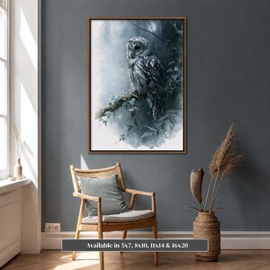 Barred owl watercolor printable wall art displayed in Scandinavian minimalist living room on slate blue wall above natural wood chair with pampas grass, moody forest owl digital download print in walnut frame