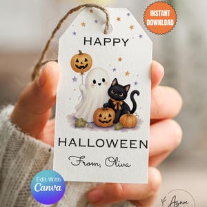 May include: A white rectangular gift tag with rounded top corners and brown twine, featuring a ghost, a black cat, and orange pumpkins. The text reads HAPPY HALLOWEEN and From, Oliva, with colorful stars and an orange INSTANT DOWNLOAD badge.