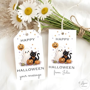 May include: Two rectangular white gift tags featuring a cartoon ghost, a black cat with an orange bow, and pumpkins. The text reads HAPPY HALLOWEEN, with one tag saying your message and the other saying from: Julia, accented by small colorful stars.