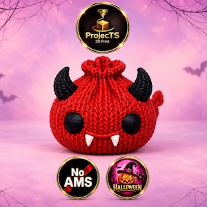 May include: A red, round, knitted-style pouch featuring two black horns, two large black eyes, and two white fangs. The pouch includes a drawstring top. Below the pouch are two circular badges, one reading No AMS and the other featuring a pumpkin.