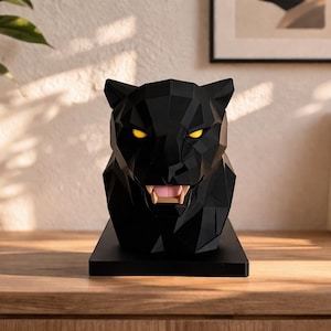 May include: A set of three ceramic mugs with a speckled, matte finish. Each mug features a different color: light blue, cream, and gray. The mugs have a simple, modern design, suitable for coffee or tea.