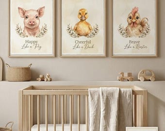 May include: A set of three framed wall art prints featuring watercolor illustrations of a pig, a duck, and a rooster. Each animal is surrounded by a leafy wreath. The text reads Happy Like a Pig, Cheerful Like a Duck, and Brave Like a Rooster.
