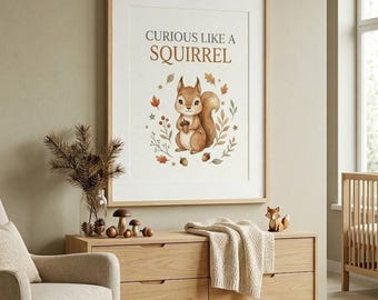 May include: A framed wall art print featuring a brown squirrel illustration surrounded by autumn leaves and acorns, with the text "CURIOUS LIKE A SQUIRREL" printed in dark brown letters above the squirrel on a white background.