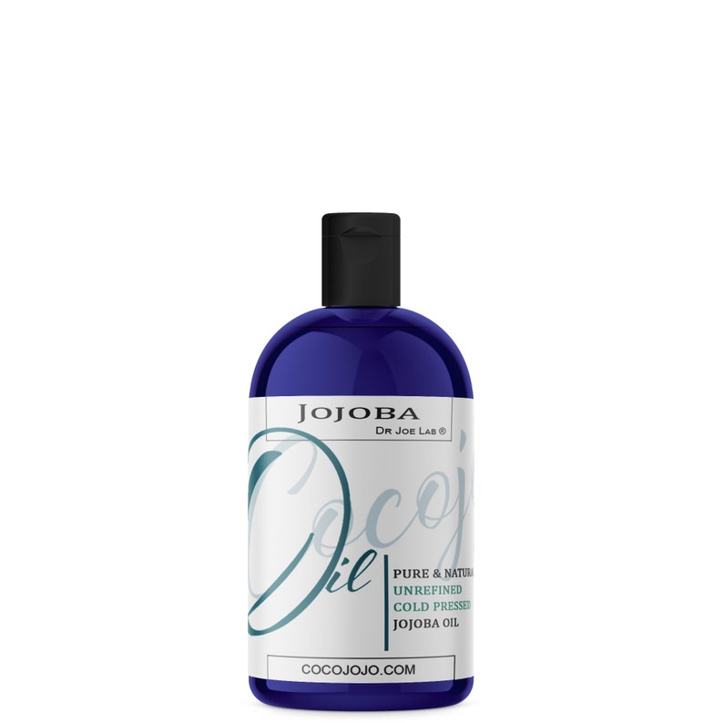 May include: A blue bottle of Jojoba Oil by Dr. Joe Lab. The bottle has a white label with the text "Jojoba Oil" in a stylized font. The label also includes the text "Pure & Natural Unrefined Cold Pressed Jojoba Oil" and "cocojojo.com".