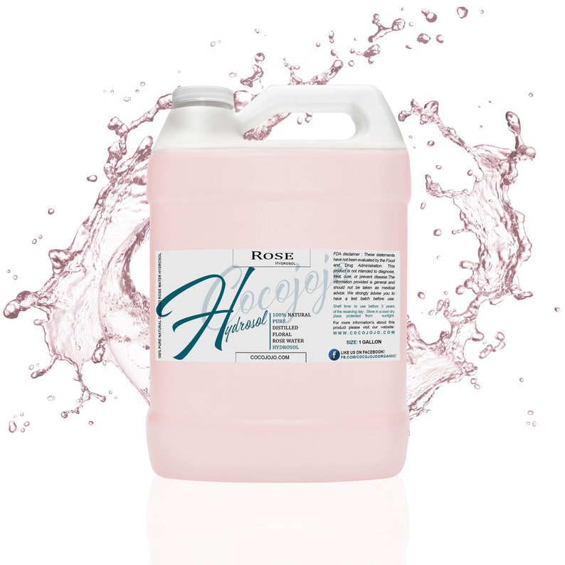 May include: A gallon jug of rose hydrosol, a 100% natural pure distilled floral rose water hydrosol. The jug is pink and has a white label with the text "Cocojojo's Hydrosol" and "ROSE Hydrosol" in a cursive font. The label also includes the text "100% Natural Pure Distilled Floral Rose Water Hydrosol" and "Cocojojo.com".