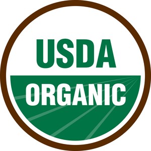 May include: A brown circle with a white background and green text. The text says "USDA ORGANIC" with the words "USDA" in a larger font size than "ORGANIC". The circle has a green field design with white lines.