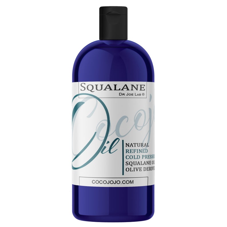 May include: A blue bottle of Dr. Joe Lab's Cocojo Squalane Oil, a natural refined cold-pressed squalane oil derived from olives. The bottle has a white label with the brand name and product description.