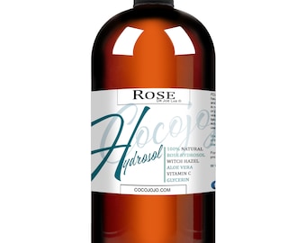 May include: A brown glass bottle with a white label that reads "ROSE DR JOE LAB" and "Hydrosol". The label also lists the ingredients: 100% Natural, Rose Hydrosol, Witch Hazel, Aloe Vera, Vitamin C, Glycerin. The website cocojojo.com is printed at the bottom of the label.