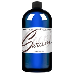 May include: A blue bottle of Coco Serum Brow & Lash Growth serum by Dr. Joe Lab. The bottle has a white label with brown text that reads "Coco Serum" and "COCOJJO.COM".