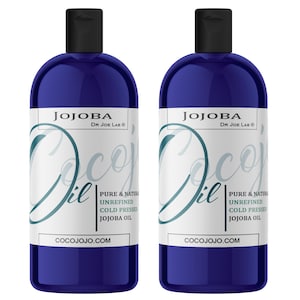 May include: Two blue bottles of Jojoba oil, labeled "Jojoba Oil" with the text "Pure & Natural Unrefined Cold Pressed Jojoba Oil" and "Cocojojo.com".