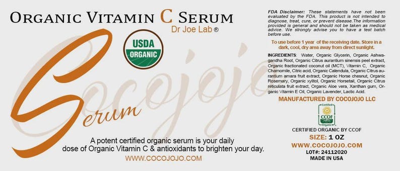May include: A label for Organic Vitamin C Serum by Dr Joe Lab. The label features the words "Organic Vitamin C Serum" in black and a stylized orange "Serum" script. Includes "USDA Organic" seal and ingredient list.
