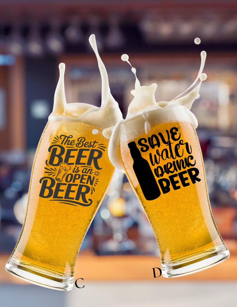 May include: Two clear glass beer glasses filled with golden lager, each featuring black text and graphics. The left glass displays 'The Best BEER is an OPEN BEER' with a small beer mug icon. The right glass shows 'SAVE water DRINK BEER' with a bottle silhouette.