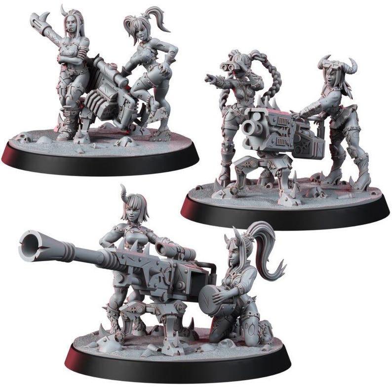 May include: Three sets of unpainted grey resin tabletop gaming miniatures featuring female figures with horns and ponytails operating heavy artillery weapons. Each set includes two figures positioned around a large mounted cannon or machine gun on a base.