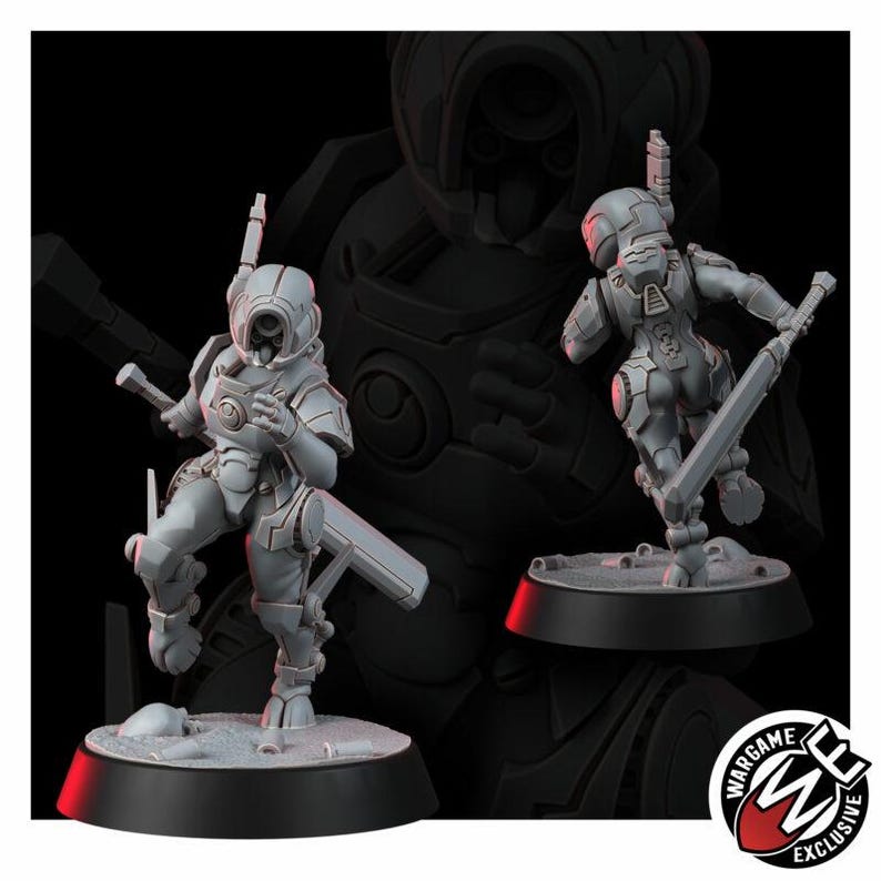 May include: Two grey resin miniature figures of armored soldiers in dynamic poses, each standing on a circular black base. The figures wear futuristic helmets and segmented armor, with one holding a long rectangular blade weapon at its side.