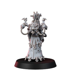 May include: A gray unpainted miniature figure featuring a hooded robe with metallic accents, a skull emblem on the back, and mechanical tubing extending from the shoulders. The figure stands on a circular black base with small metal spikes.